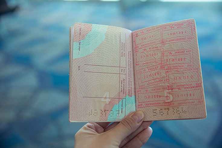 Visa vs passport (source:pexels)